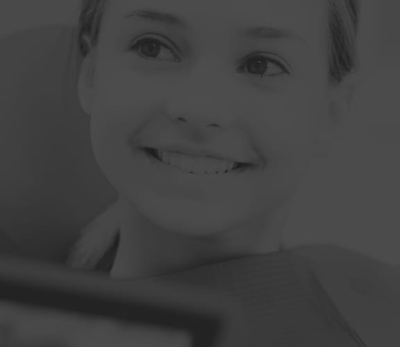 Woman sitting in dental chair